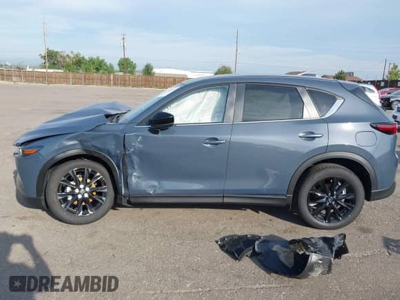 2025 Mazda CX-5 S Carbon Edition z VIN JM3KFBCM3S0689995, wystawiony jako IAAI lot #42922834 z przebiegiem 2 087 mil mil oraz . Historia ofert i sprzedaży dostępna na DreamBid. Obrazek 15.