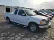 2001 Ford F-150 XL with VIN 1FTZX17231KF34373, listed as a Copart auction lot 68665815 with 161,328 mi miles and Clean title. Bid and sale history available at DreamBid. Image 4.