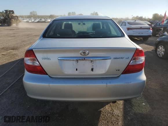 2002 Toyota Camry XLE with VIN JTDBF32KX20054853, listed as a Copart auction lot 84247555 with 176,850 mi miles and Clean title. Bid and sale history available at DreamBid. Image 6.