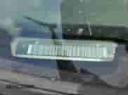 2007 Chevrolet Suburban LT z VIN 3GNFC16027G135928, wystawiony jako Copart lot #66864605 z przebiegiem 289 418 mil mil oraz Szkoda całkowita • Salvage title. Historia ofert i sprzedaży dostępna na DreamBid. Obrazek 13.
