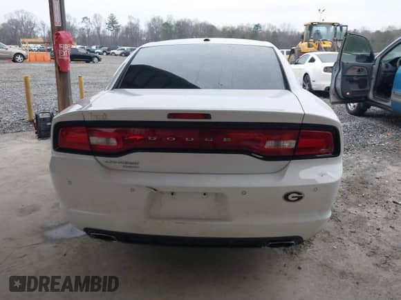 2013 Dodge Charger SXT with VIN 2C3CDXJG8DH528767, listed as a IAAI auction lot 41627596 with 204,619 mi miles and . Bid and sale history available at DreamBid. Image 16.