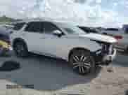 2024 Nissan Pathfinder Platinum with VIN 5N1DR3DJ9RC292976, listed as a Copart auction lot 68870815 with 12,305 mi miles and Salvage title. Bid and sale history available at DreamBid. Image 4.