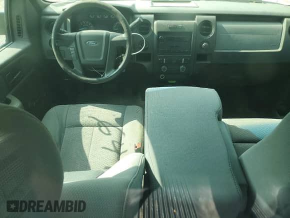 2012 Ford F-150 XL z VIN 1FTNF1CF6CKD39297, wystawiony jako Copart lot #64983775 z przebiegiem 169 861 mil mil oraz Szkoda całkowita • Salvage title. Historia ofert i sprzedaży dostępna na DreamBid. Obrazek 8.