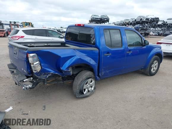 2013 Nissan Frontier SV with VIN 1N6AD0EV3DN762662, listed as a IAAI auction lot 43420036 with 118,397 mi miles and . Bid and sale history available at DreamBid. Image 4.