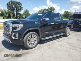 2020 GMC Sierra 1500 Denali z VIN 3GTU9FET2LG249378, wystawiony jako Copart lot #68769755 z przebiegiem 96 475 mil mil oraz Czysty tytuł • Clean title. Historia ofert i sprzedaży dostępna na DreamBid. Obrazek 1.