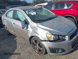 2013 Chevrolet Sonic LTZ with VIN 1G1JE5SG0D4113306, listed as a IAAI auction lot 41897356 with 135,291 mi miles and . Bid and sale history available at DreamBid. Image 1.