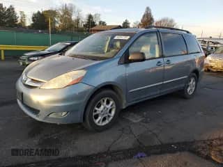2006 Toyota Sienna XLE z VIN 5TDBA22C06S071245, wystawiony jako Copart lot #90394735 z przebiegiem 256 080 mil mil oraz Czysty tytuł • Clean title. Historia ofert i sprzedaży dostępna na DreamBid. Obrazek 1.
