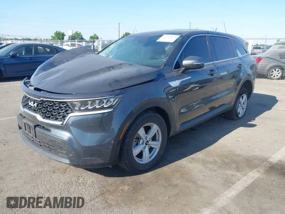2023 Kia Sorento LX with VIN 5XYRGDLC8PG207918, listed as a IAAI auction lot 42454929 with 49,466 mi miles and . Bid and sale history available at DreamBid. Image 2.