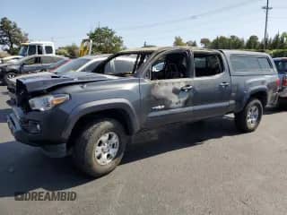 2018 Toyota Tacoma SR5 с VIN 3TMBZ5DN9JM017024, выставлен на аукционе Copart как лот 60479765 с пробегом Не указан миль и На запчасти • Non repairable. История ставок и продаж доступна на DreamBid. Изображение 1.
