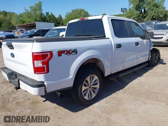 2018 Ford F-150 XL z VIN 1FTEW1E5XJKF91572, wystawiony jako IAAI lot #43055529 z przebiegiem Nie podano mil oraz . Historia ofert i sprzedaży dostępna na DreamBid. Obrazek 4.