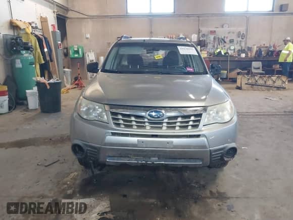 2013 Subaru Forester X z VIN JF2SHABC6DG424991, wystawiony jako IAAI lot #41638591 z przebiegiem 152 047 mil mil oraz . Historia ofert i sprzedaży dostępna na DreamBid. Obrazek 12.
