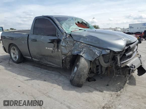 2012 Ram 1500 Tradesman с VIN 3C6JD6AT7CG218173, выставлен на аукционе Copart как лот 70530725 с пробегом 126 214 миль миль и На запчасти • Non repairable. История ставок и продаж доступна на DreamBid. Изображение 4.