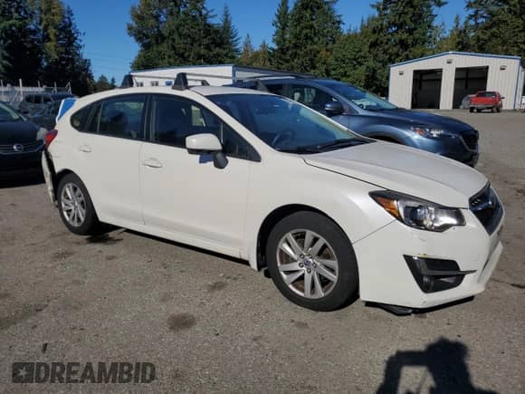 2015 Subaru Impreza Premium with VIN JF1GPAC60F8315591, listed as a Copart auction lot 86169635 with 69,170 mi miles and Salvage title. Bid and sale history available at DreamBid. Image 4.