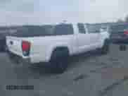 2022 Toyota Tacoma SR with VIN 3TYSX5EN9NT014347, listed as a IAAI auction lot 41631557 with 10 mi miles and . Bid and sale history available at DreamBid. Image 4.