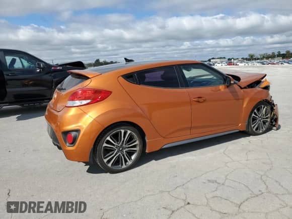 2016 Hyundai Veloster Turbo with VIN KMHTC6AE2GU299653, listed as a Copart auction lot 85747015 with 77,816 mi miles and Salvage title. Bid and sale history available at DreamBid. Image 3.