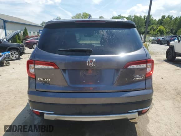 2021 Honda Pilot Touring 7-Passenger z VIN 5FNYF6H67MB060507, wystawiony jako Copart lot #68040985 z przebiegiem 68 639 mil mil oraz Szkoda całkowita • Salvage title. Historia ofert i sprzedaży dostępna na DreamBid. Obrazek 6.