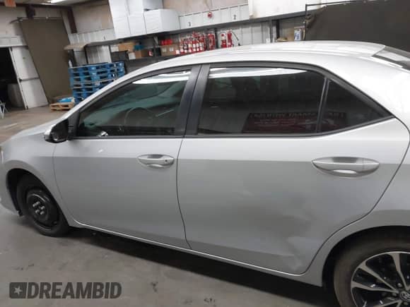 2019 Toyota Corolla L with VIN 2T1BURHE2KC194542, listed as a IAAI auction lot 42853754 with 99,110 mi miles and . Bid and sale history available at DreamBid. Image 14.
