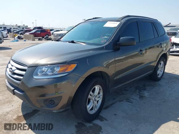 2012 Hyundai Santa Fe GLS с VIN 5XYZG3AB2CG124760, выставлен на аукционе IAAI как лот 43210891 с пробегом 186 379 миль миль и . История ставок и продаж доступна на DreamBid. Изображение 2.