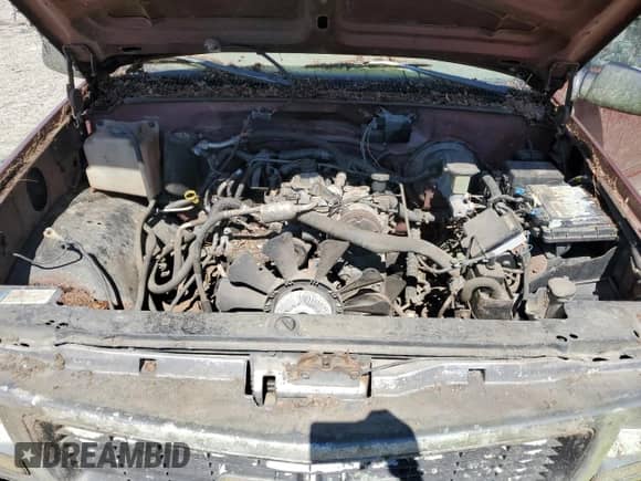 1998 GMC Sierra 1500 z VIN 1GTEC14W2WZ550452, wystawiony jako Copart lot #62010275 z przebiegiem 214 269 mil mil oraz Czysty tytuł • Clean title. Historia ofert i sprzedaży dostępna na DreamBid. Obrazek 12.