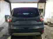 2018 Ford Escape SE с VIN 1FMCU9GD7JUB38963, выставлен на аукционе Copart как лот 81614915 с пробегом 122 572 миль миль и Списание • Salvage title. История ставок и продаж доступна на DreamBid. Изображение 6.