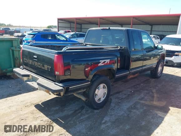 1997 Chevrolet Silverado 1500 with VIN 2GCEK19R5V1180353, listed as a IAAI auction lot 43385908 with 231,909 mi miles and . Bid and sale history available at DreamBid. Image 4.