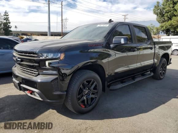 2022 Chevrolet Silverado 1500 RST with VIN 1GCPWDED5NZ142606, listed as a Copart auction lot 79077014 with 26,769 mi miles and Salvage title. Bid and sale history available at DreamBid. Image 1.