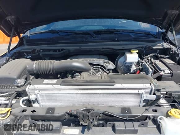 2022 Ram 1500 Big Horn z VIN 1C6RREMT4NN398555, wystawiony jako IAAI lot #43294246 z przebiegiem 21 094 mil mil oraz . Historia ofert i sprzedaży dostępna na DreamBid. Obrazek 10.