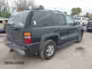 2003 Chevrolet Tahoe LT with VIN 1GNEC13Z93R296379, listed as a IAAI auction lot 41574575 with 301,567 mi miles and . Bid and sale history available at DreamBid. Image 4.