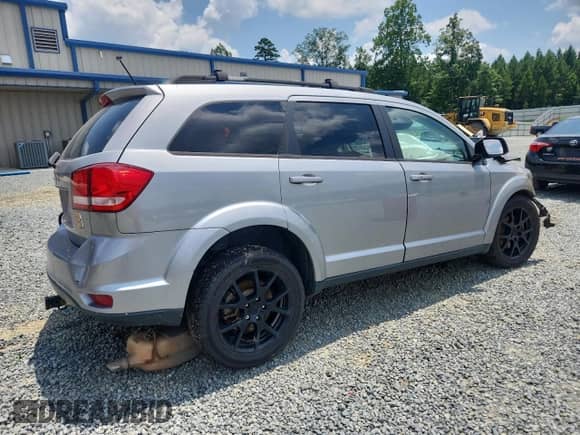 2017 Dodge Journey SXT with VIN 3C4PDCBB1HT558828, listed as a Copart auction lot 64690055 with Not provided miles and Salvage title. Bid and sale history available at DreamBid. Image 3.