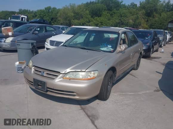 2002 Honda Accord LX with VIN 3HGCG564X2G701595, listed as a IAAI auction lot 43077661 with 231,196 mi miles and . Bid and sale history available at DreamBid. Image 2.