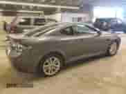 2007 Hyundai Tiburon GS with VIN KMHHM66D17U258112, listed as a Copart auction lot 60286334 with 117,735 mi miles and Salvage title. Bid and sale history available at DreamBid. Image 3.