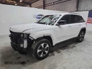 2024 Jeep Grand Cherokee with VIN 1C4RJYB69RC129743, listed as a Copart auction lot 87460235 with 56,990 mi miles and Clean title. Bid and sale history available at DreamBid. Image 1.