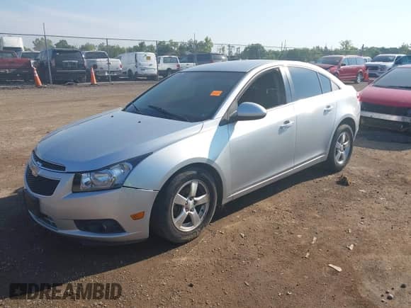 2012 Chevrolet Cruze 1LT with VIN 1G1PF5SC9C7146371, listed as a IAAI auction lot 43004457 with 153,514 mi miles and . Bid and sale history available at DreamBid. Image 2.