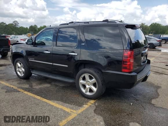 2009 Chevrolet Tahoe LTZ with VIN 1GNFC33079R121106, listed as a Copart auction lot 53945835 with 115,330 mi miles and Salvage title. Bid and sale history available at DreamBid. Image 2.