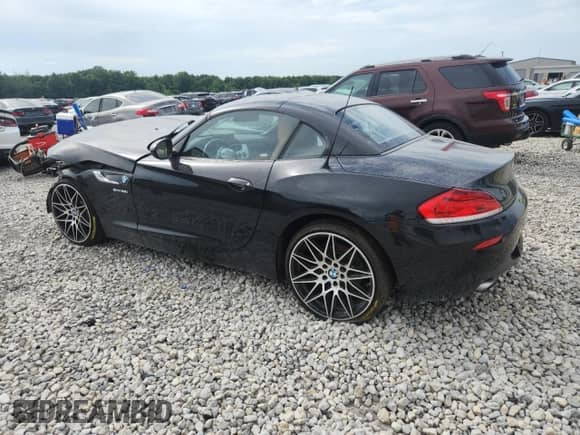 2014 BMW Z4 sDrive35i with VIN WBALM7C57EE386327, listed as a Copart auction lot 63266335 with Not provided miles and Salvage title. Bid and sale history available at DreamBid. Image 2.