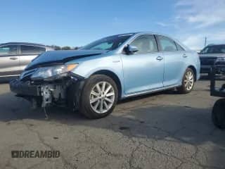 2014 Toyota Camry LE with VIN 4T1BD1FK0EU110750, listed as a Copart auction lot 82721045 with 137,465 mi miles and Clean title. Bid and sale history available at DreamBid. Image 1.