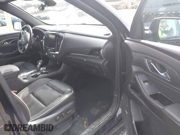 2023 Chevrolet Traverse Premier with VIN 1GNEVKKWXPJ154747, listed as a IAAI auction lot 41606886 with 36,182 mi miles and . Bid and sale history available at DreamBid. Image 5.