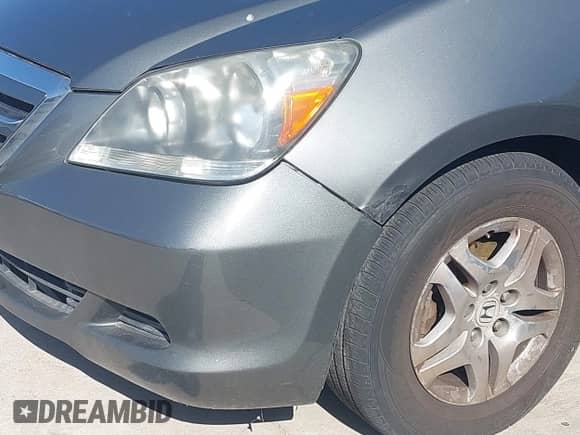 2007 Honda Odyssey EX-L z VIN 5FNRL38787B080046, wystawiony jako IAAI lot #42240227 z przebiegiem 138 073 mil mil oraz . Historia ofert i sprzedaży dostępna na DreamBid. Obrazek 13.