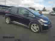 2018 Chevrolet Bolt EV LT with VIN 1G1FW6S0XJ4137894, listed as a Copart auction lot 82420725 with 241,410 mi miles and Clean title. Bid and sale history available at DreamBid. Image 4.