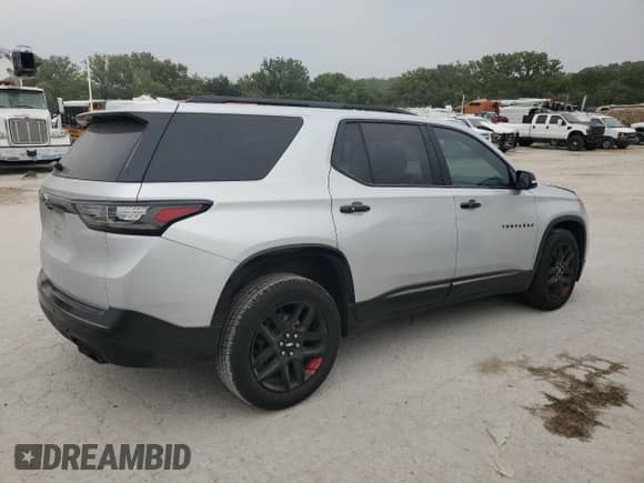2018 Chevrolet Traverse Premier z VIN 1GNERKKW9JJ100786, wystawiony jako Copart lot #71393895 z przebiegiem 162 859 mil mil oraz Szkoda całkowita • Salvage title. Historia ofert i sprzedaży dostępna na DreamBid. Obrazek 3.