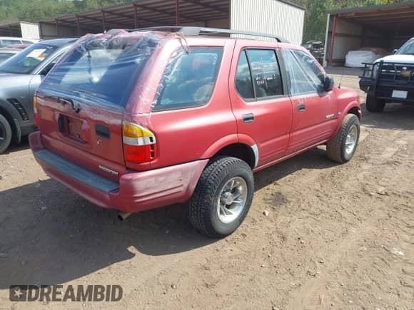 1998 Honda Passport LX with VIN 4S6CK58W6W4420329, listed as a IAAI auction lot 43410300 with 214,614 mi miles and . Bid and sale history available at DreamBid. Image 4.