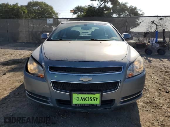 2009 Chevrolet Malibu 1LT с VIN 1G1ZH57B09F128424, выставлен на аукционе Copart как лот 69096395 с пробегом 126 461 миль миль и Списание • Salvage title. История ставок и продаж доступна на DreamBid. Изображение 5.
