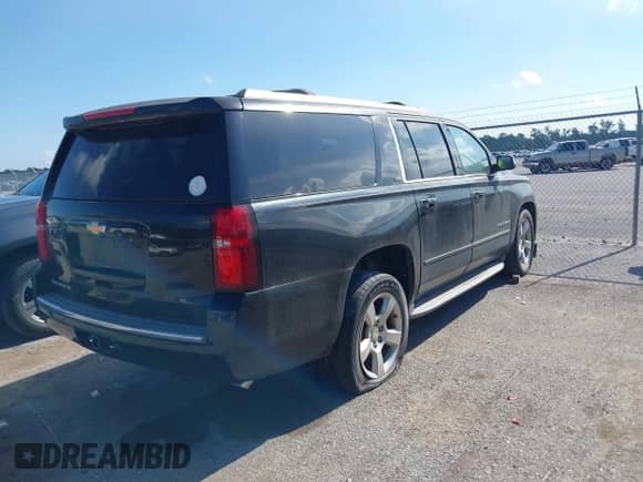 2015 Chevrolet Suburban LTZ with VIN 1GNSCKKC1FR144669, listed as a IAAI auction lot 42558221 with 199,669 mi miles and . Bid and sale history available at DreamBid. Image 4.