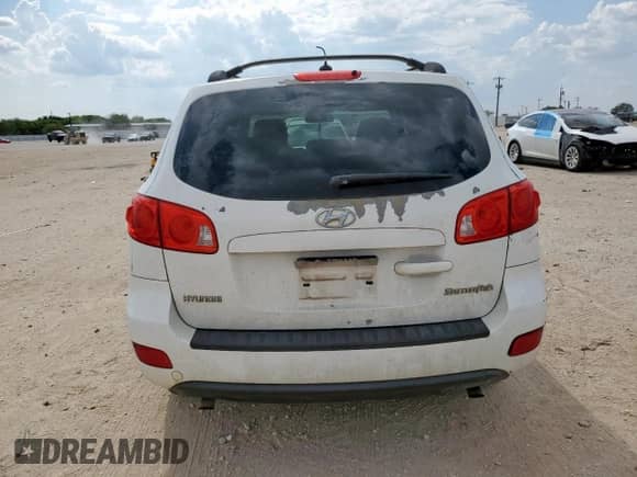 2009 Hyundai Santa Fe GLS z VIN 5NMSG13D29H301276, wystawiony jako Copart lot #70279395 z przebiegiem 212 937 mil mil oraz Szkoda całkowita • Salvage title. Historia ofert i sprzedaży dostępna na DreamBid. Obrazek 6.