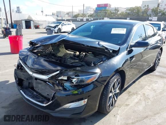 2020 Chevrolet Malibu RS with VIN 1G1ZG5STXLF135018, listed as a IAAI auction lot 43195958 with 94,145 mi miles and . Bid and sale history available at DreamBid. Image 6.
