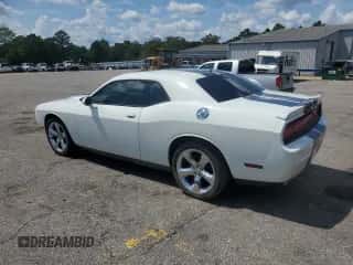2012 Dodge Challenger SXT Plus с VIN 2C3CDYAG7CH128221, выставлен на аукционе Copart как лот 68112035 с пробегом 81 819 миль миль и Списание • Salvage title. История ставок и продаж доступна на DreamBid. Изображение 2.