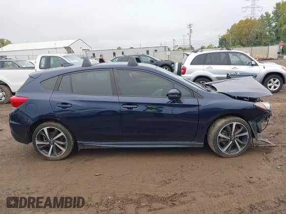 2021 Subaru Impreza Special Sports with VIN 4S3GTAL6XM3704691, listed as a IAAI auction lot 43277055 with 51,895 mi miles and . Bid and sale history available at DreamBid. Image 14.