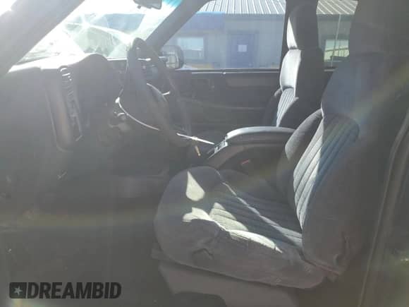 2001 Chevrolet S-10 LS с VIN 1GCDT19WX1K138172, выставлен на аукционе Copart как лот 79623404 с пробегом 167 179 миль миль и Списание • Salvage title. История ставок и продаж доступна на DreamBid. Изображение 7.