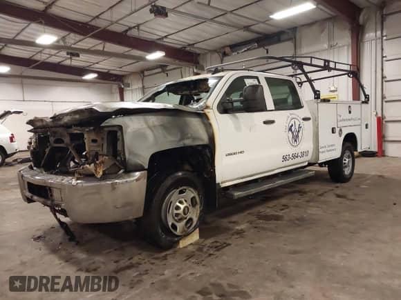 2015 Chevrolet Silverado 2500HD Work Truck with VIN 1GC1CUEG8FF641153, listed as a IAAI auction lot 42950169 with Not provided miles and . Bid and sale history available at DreamBid. Image 2.