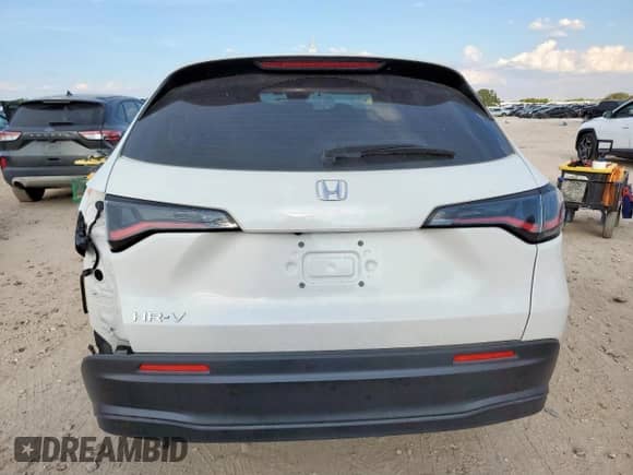 2024 Honda HR-V LX z VIN 3CZRZ1H34RM739751, wystawiony jako Copart lot #71668765 z przebiegiem Nie podano mil oraz Szkoda całkowita • Salvage title. Historia ofert i sprzedaży dostępna na DreamBid. Obrazek 6.